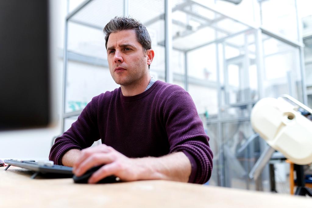 Quantum computing lab with researchers working