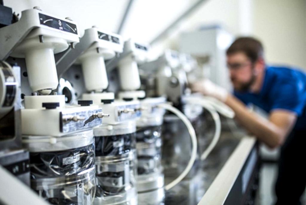 Advanced technology laboratory with holographic displays and quantum computing equipment