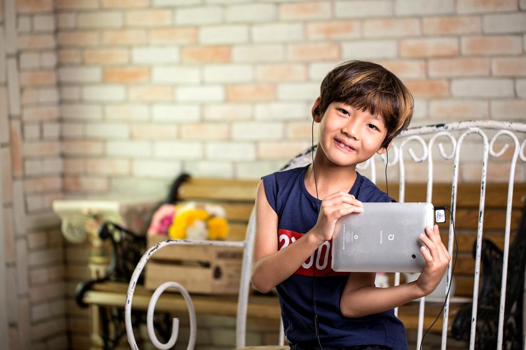Person watching an educational video on a tablet